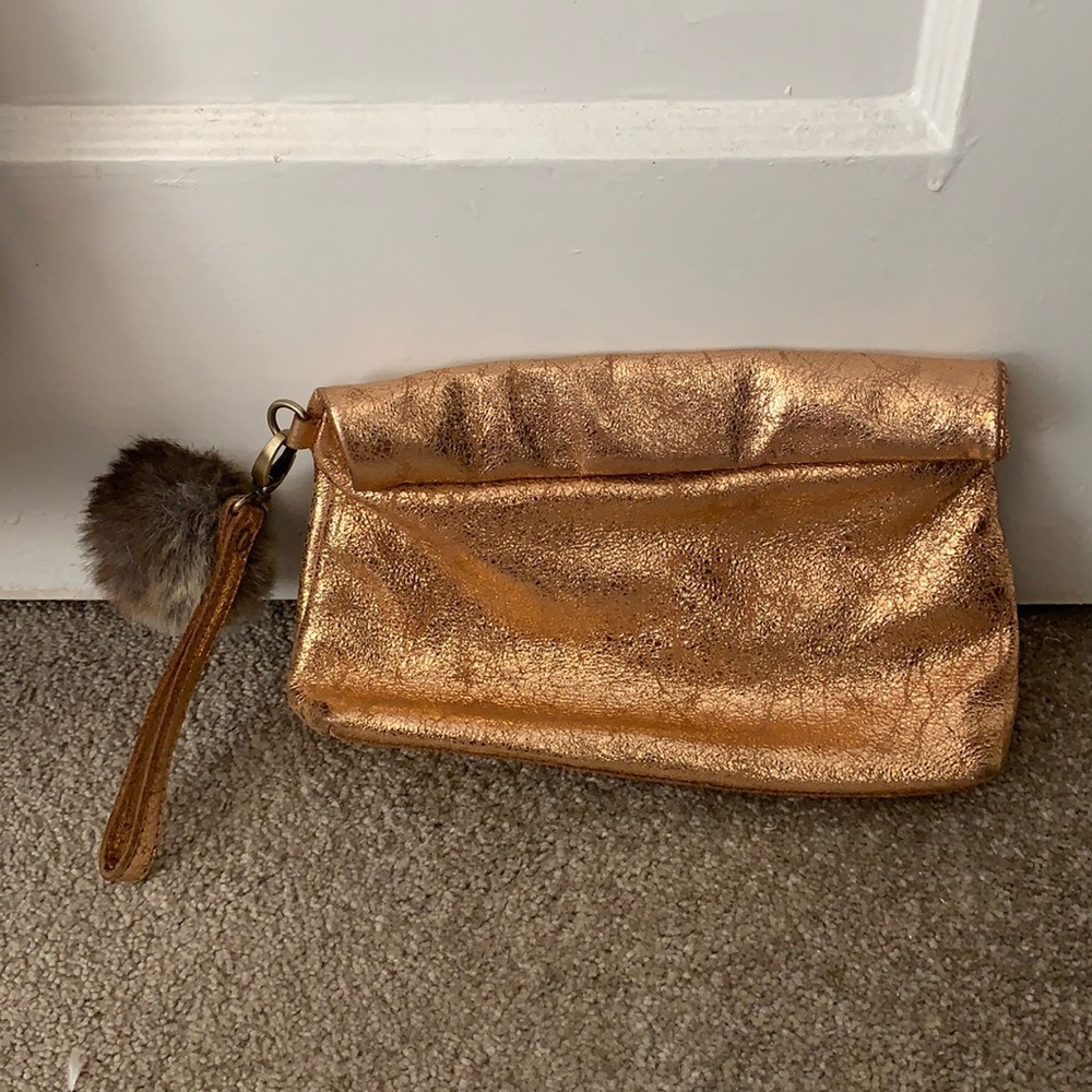 Metallic rose gold clutch